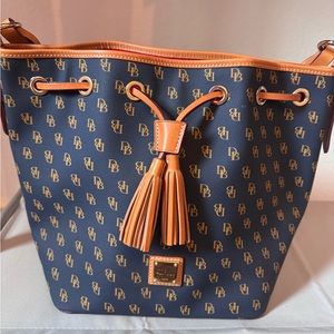 Dooney & Bourke! Gretta Drawstring bag. Beautiful!! Color Navy .